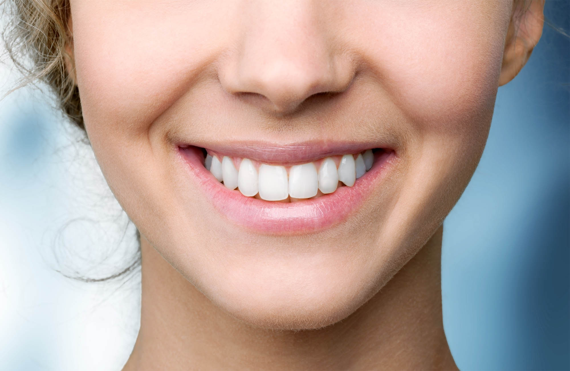 Beautiful wide smile of young fresh woman with great healthy whi